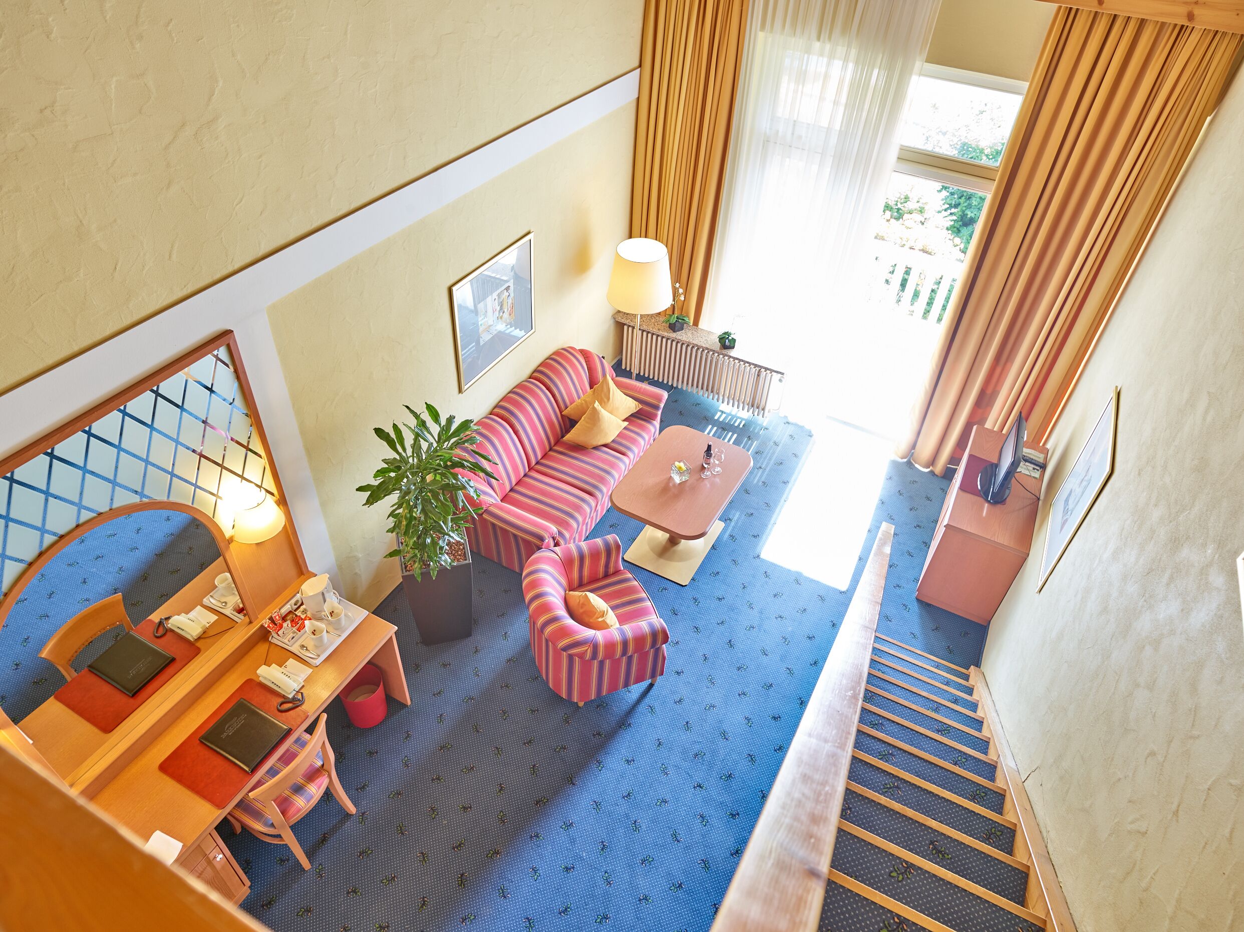 duplex | living area | 32-inch flat-screen tv with satellite channels, tv, table football