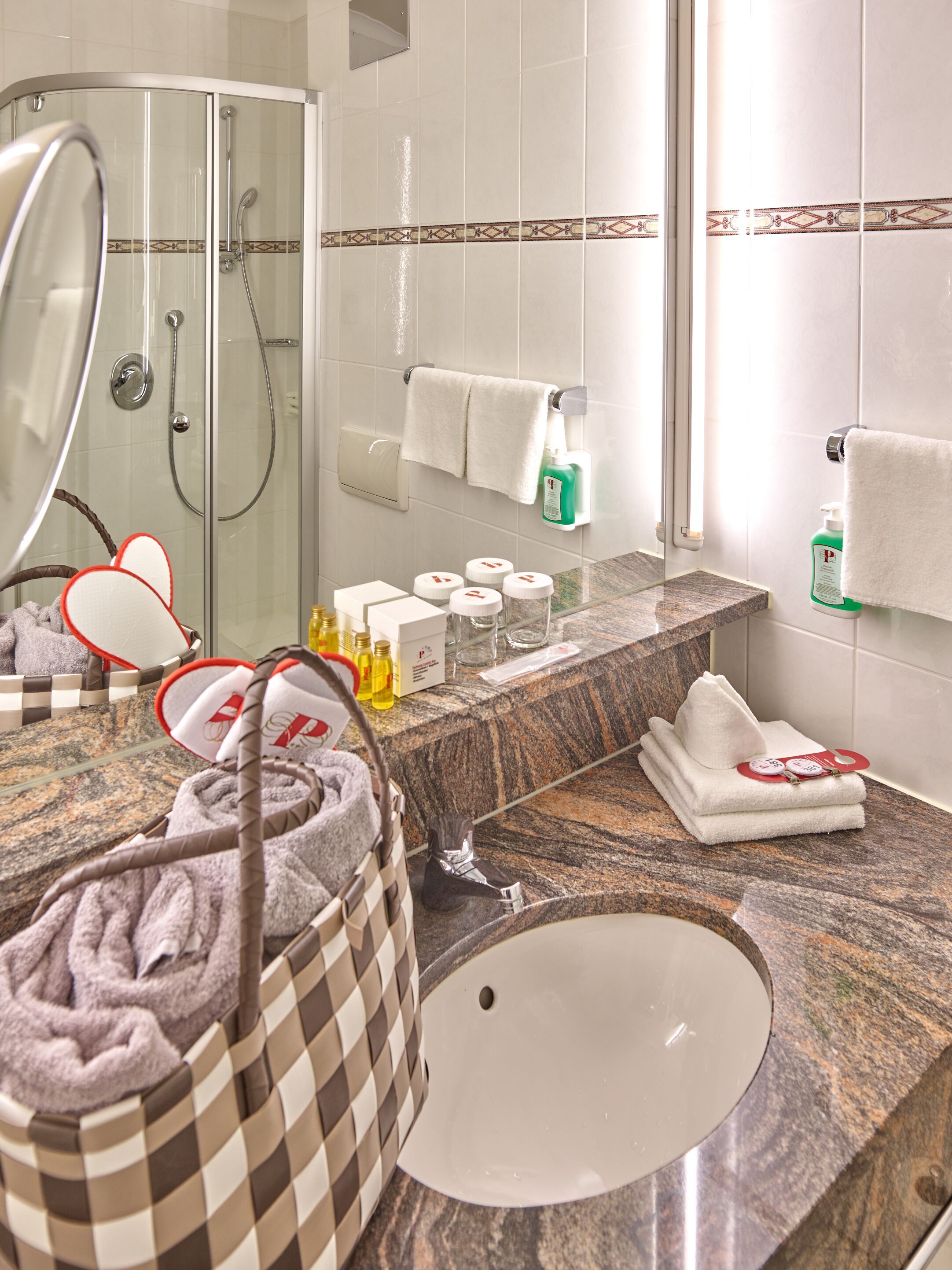 hair dryer, bathrobes, slippers, towels