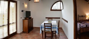 Apartment, 1 Bedroom (Granaio) | Living area | 32-inch LED TV with satellite channels, TV