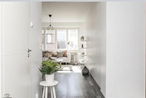 City Apartment, Sauna | Living room | Flat-screen TV