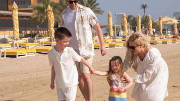 Private beach, white sand, sun-loungers, beach umbrellas