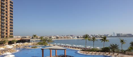 Outdoor pool, open 8:30 AM to 8:00 PM, free pool cabanas, pool umbrellas