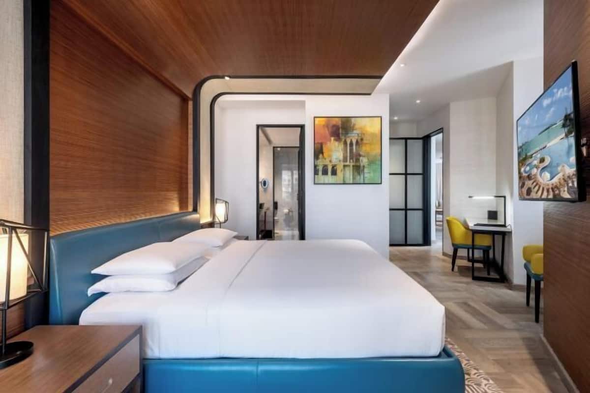 Premium bedding, in-room safe, blackout curtains, iron/ironing board