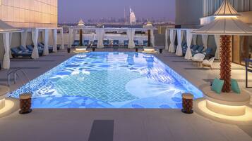 Outdoor pool, open 8:30 AM to 8:00 PM, free pool cabanas, pool umbrellas