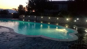 Seasonal outdoor pool, pool umbrellas, pool loungers