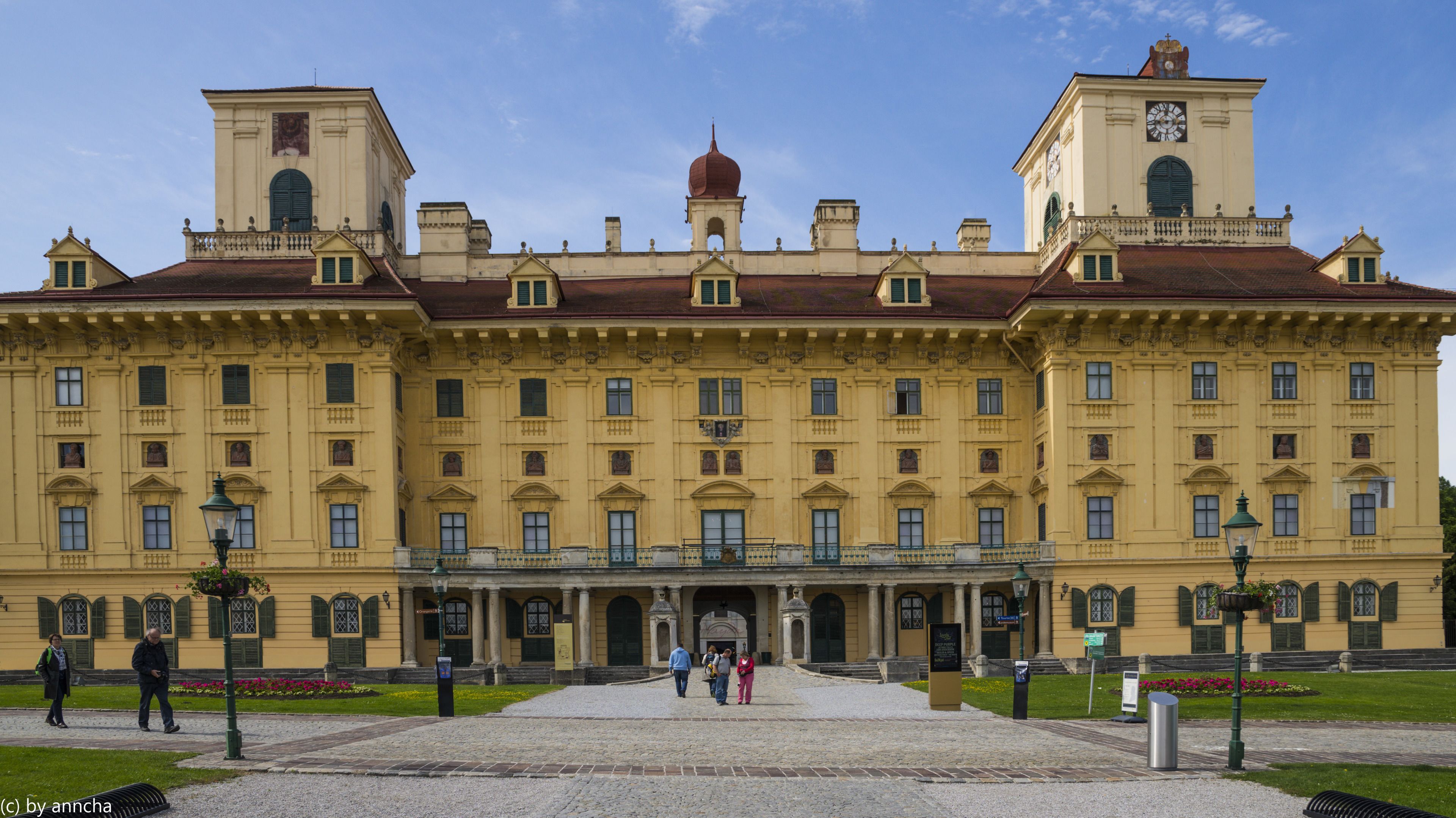 A large, historic building with a symmetrical facade, multiple windows, and a central entrance.