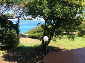 Enjoy a serene coastal retreat with a beautifully landscaped garden and stunning sea views.