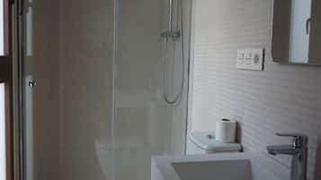 Shower, free toiletries, hair dryer, towels