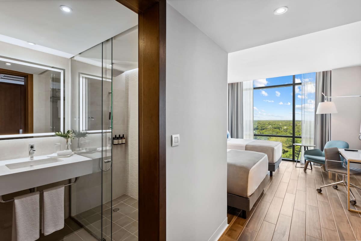 shower, eco-friendly toiletries, hair dryer, towels