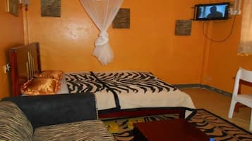 Tabla de planchar con plancha, wifi gratis y ropa de cama