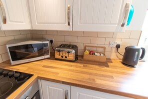 Fridge, microwave, electric kettle, toaster