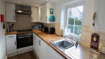 Fridge, microwave, electric kettle, toaster