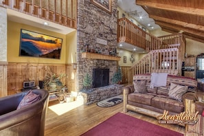 Flat-screen TV, fireplace, video games, DVD player