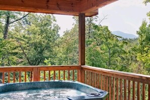 Outdoor spa tub - Above The Clouds is a perfect Smoky Mountain Getaway for the family or 2 couples! (Sevierville)