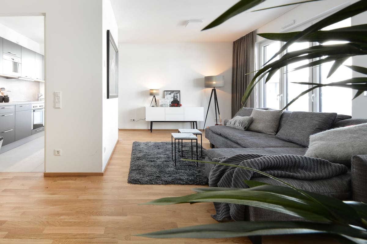 Design Apartment, 1 Bedroom (Kontaktloser Check-in - C) | Living area | 40-inch flat-screen TV with cable channels, LCD TV, heated floors