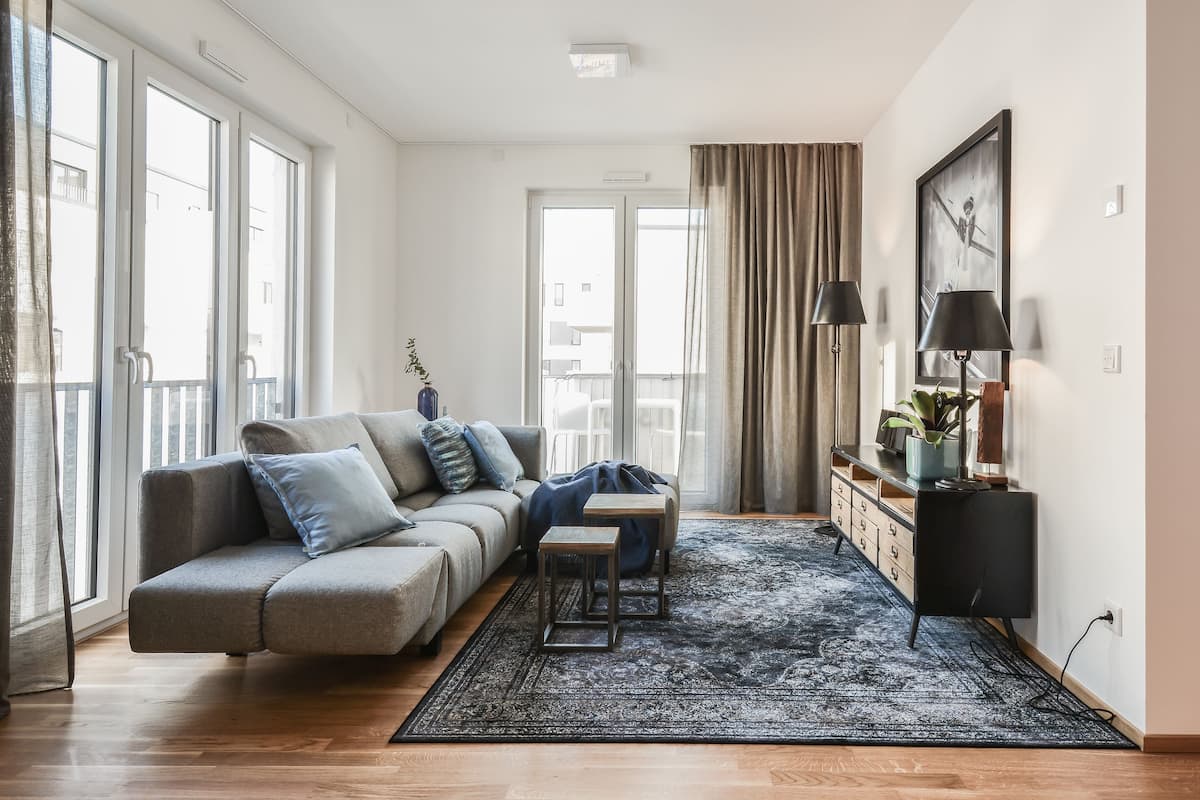 Design Apartment, 1 Bedroom (Kontaktloser Check-in - F) | Living area | 40-inch flat-screen TV with cable channels, LCD TV, heated floors