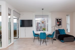 Appartement, 1 slaapkamer | Woonruimte | Een smart-tv