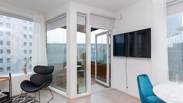 Apartamento, 1 habitación | Sala de estar | Una Smart TV