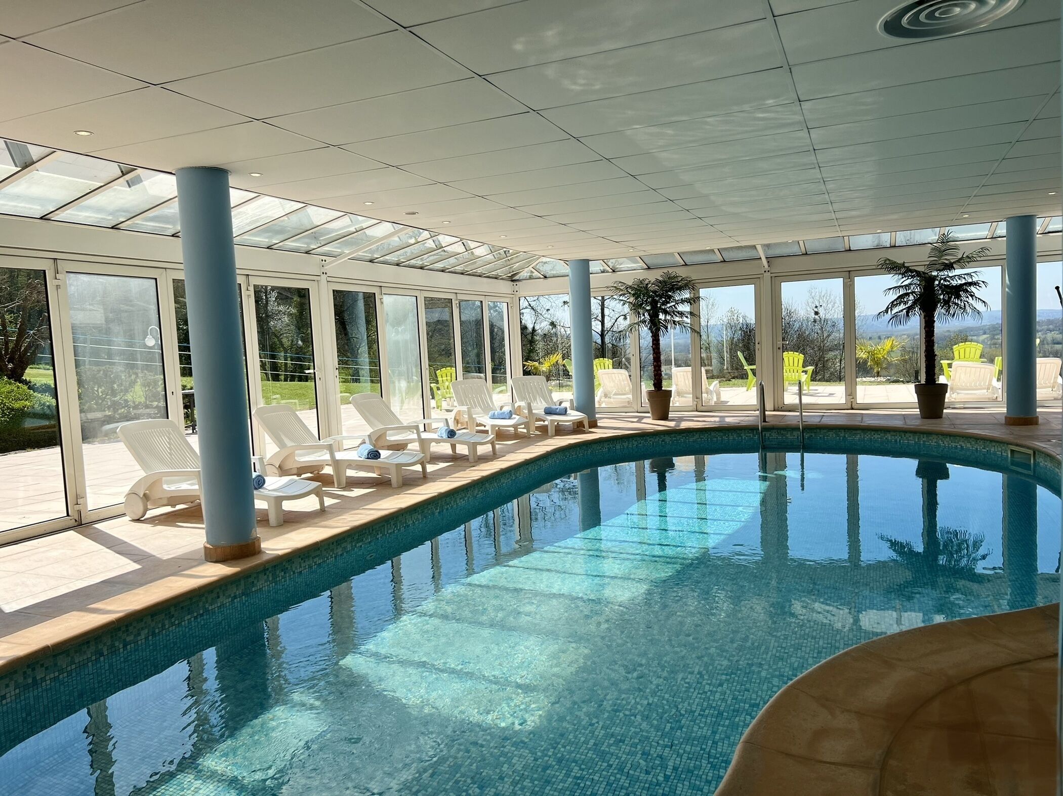 indoor pool, open 8:30 am to 10:00 pm, pool loungers