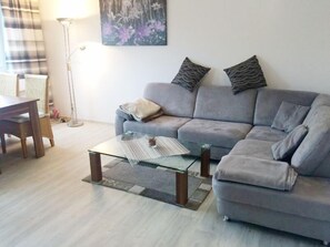 Apartment, 1 Bedroom | Living room | 120-cm LED TV with cable channels, TV