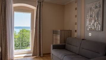 Room, Sea View (LUX) | Living area | Flat-screen TV