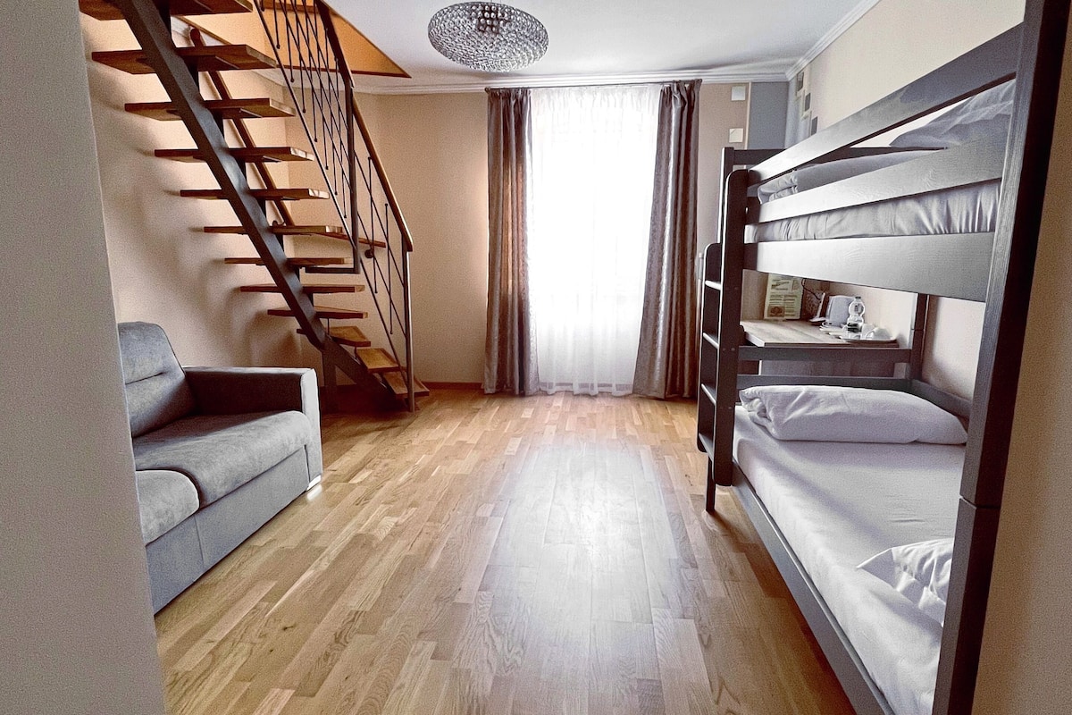 family room, sea view | living area | flat-screen tv