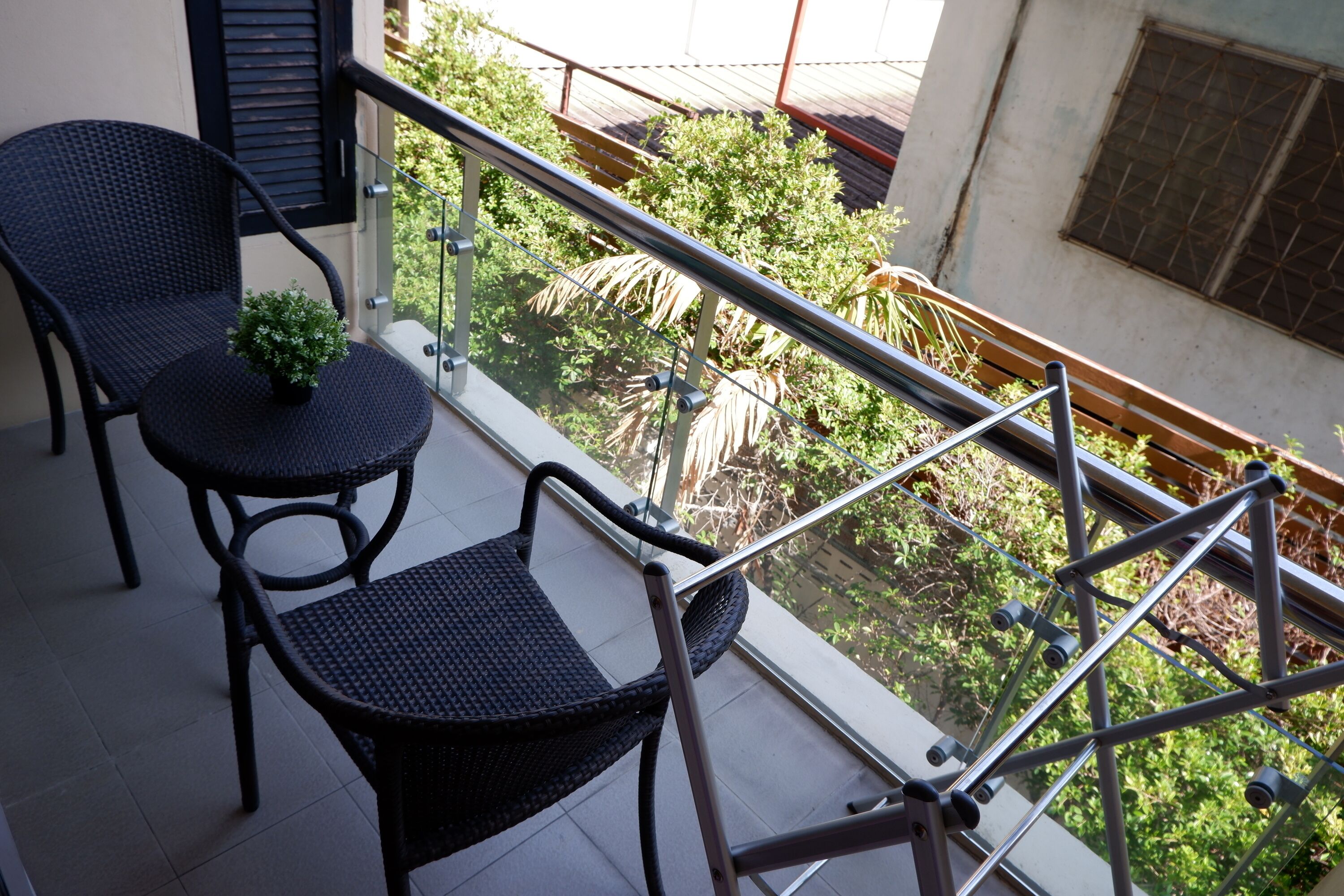 one bedroom suite with pool view | balcony view