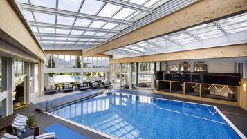 3 indoor pools, outdoor pool, open 7:00 AM to 9:00 PM, pool umbrellas