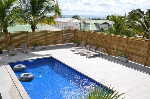 HIBISCUS AND ITS PANORAMIC SEA VIEW