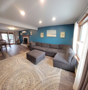 Smart TV, fireplace, table football, music library