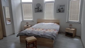 Habitación doble | Cunas o camas infantiles gratuitas, wifi gratis, ropa de cama