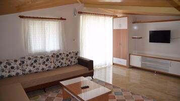 Standard Penthouse, 2 Bedrooms | Living area | LCD TV