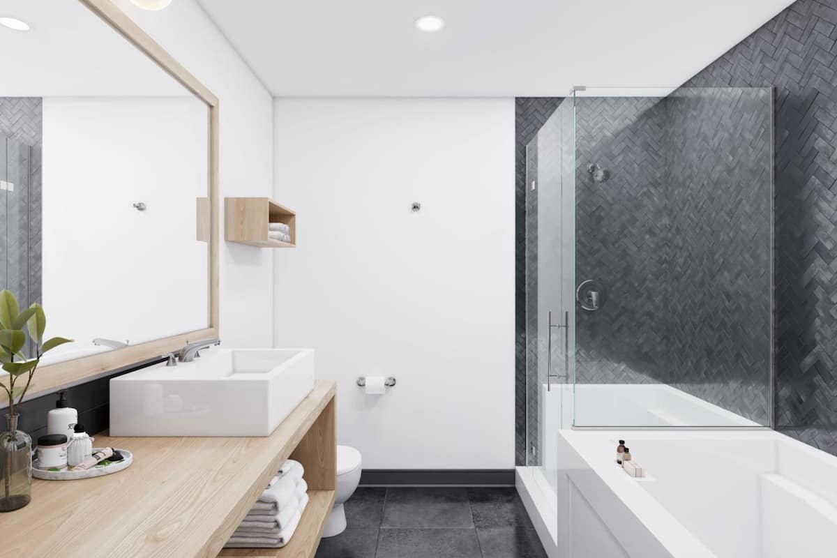 combined shower/bathtub, designer toiletries, hair dryer, towels
