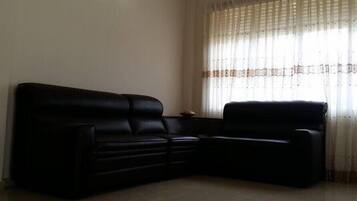 Coin salon dans le hall