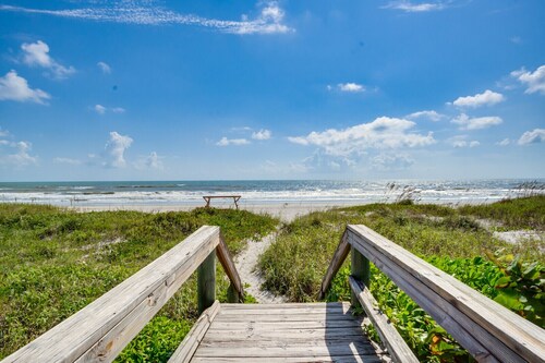 RIVERFRONT community in COCOA BEACH with short  walk to the beach!!