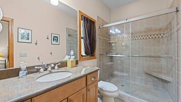 Combined shower/bathtub, hair dryer, towels, soap