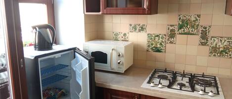 Fridge, microwave, stovetop