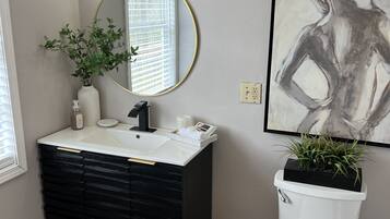 Hair dryer, towels, soap, shampoo