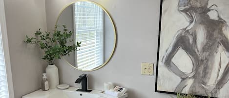 Hair dryer, towels, soap, shampoo