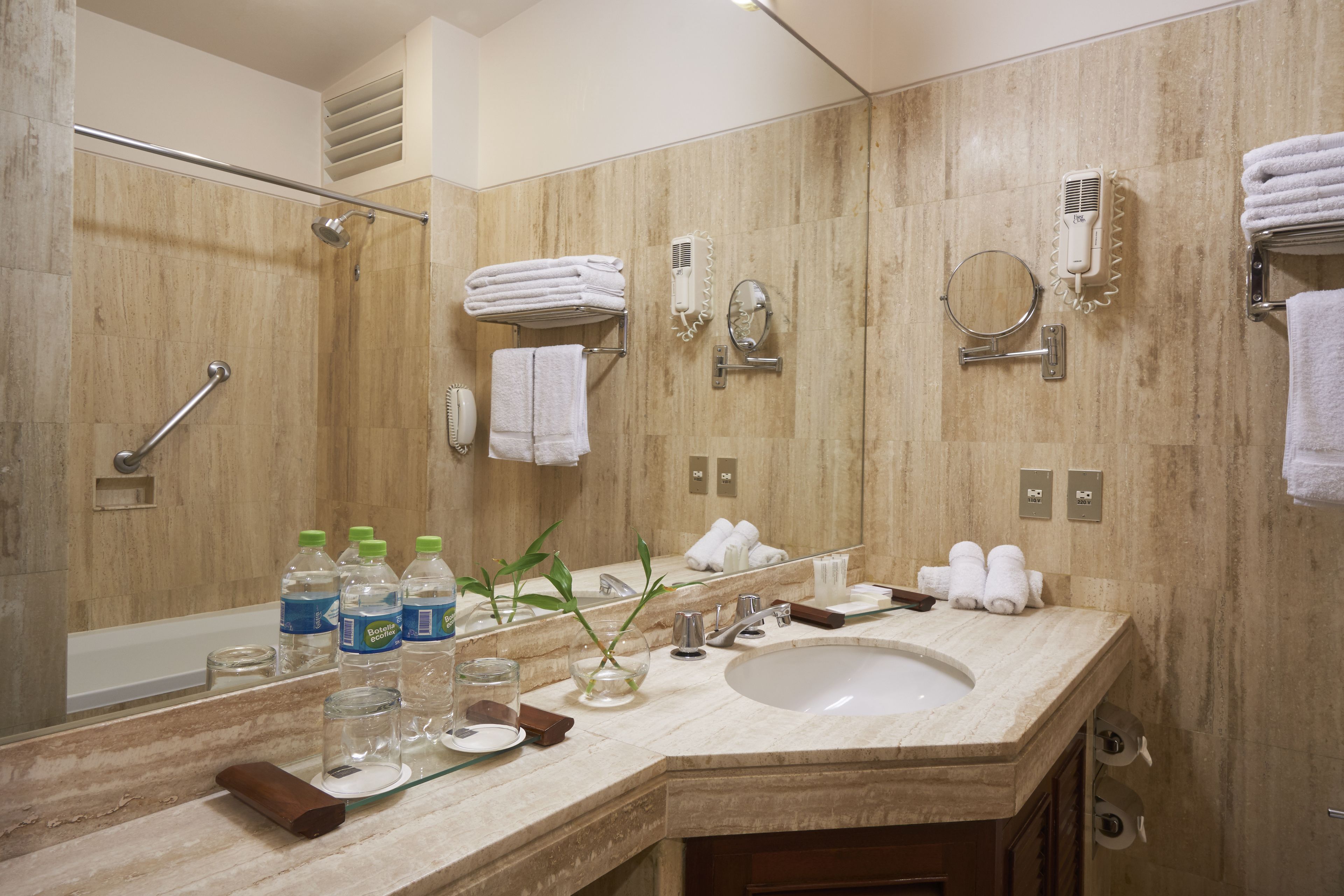 bathtub, free toiletries, hair dryer, slippers