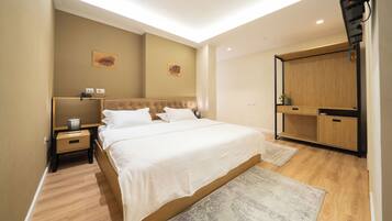 Frette Italian sheets, premium bedding, pillowtop beds, minibar