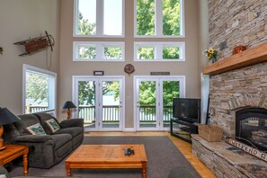 House, Multiple Beds, Fireplace | Living room | 42-inch TV with cable channels, fireplace - Odyssey's End (McHenry)