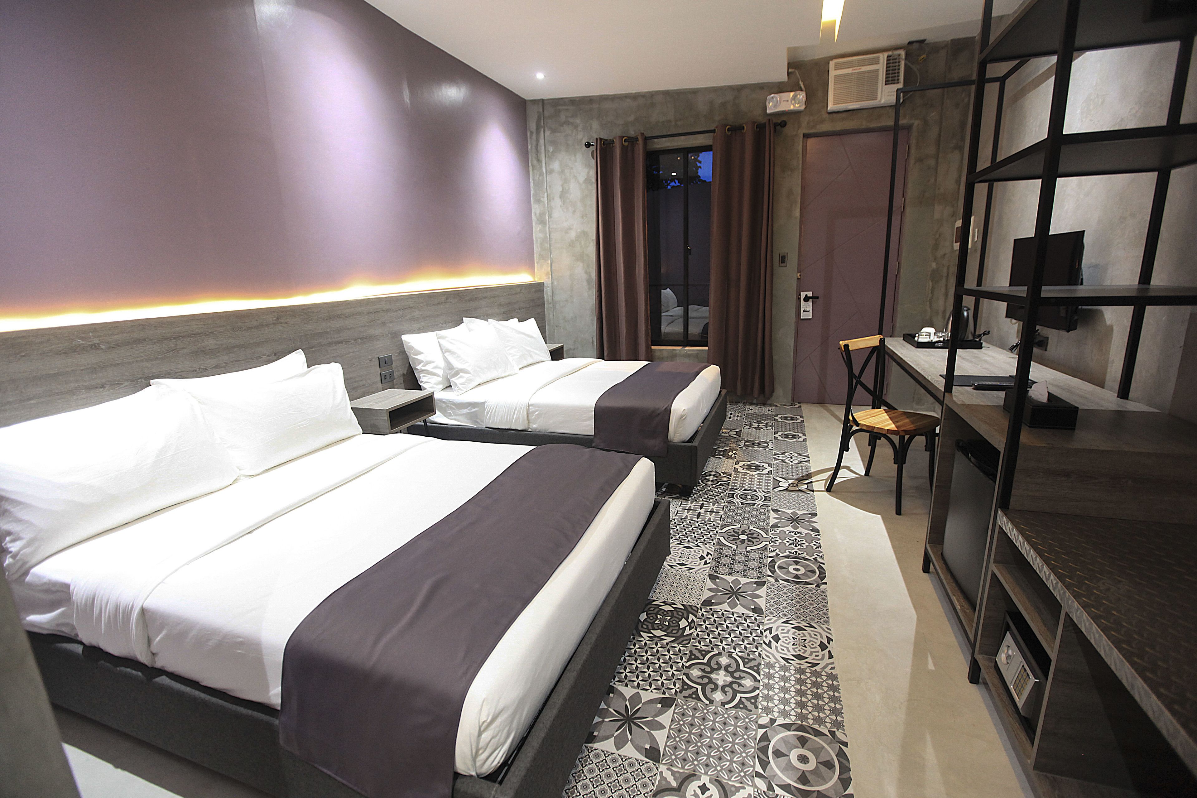 quadruple room | 1 bedroom, down duvets, minibar, in-room safe