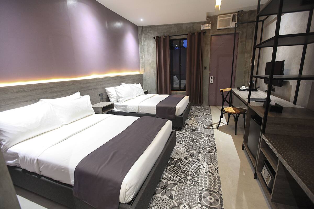 quadruple room | 1 bedroom, down duvets, minibar, in-room safe