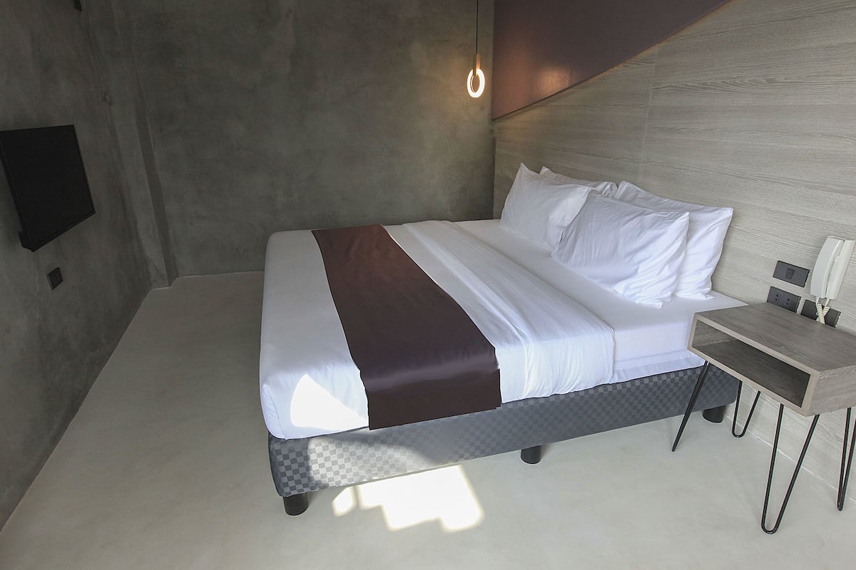 The Ocean View Family Room | Down comforters, minibar, in-room safe, laptop workspace
