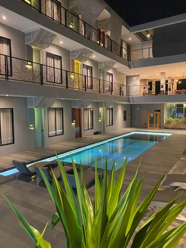 Outdoor pool, open 7:00 AM to 9:00 PM, sun loungers