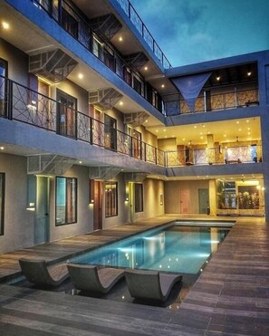 Outdoor pool, open 7:00 AM to 9:00 PM, sun loungers - Zenvea Hotel Coron (Coron)