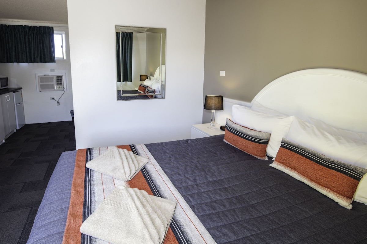 Blackout curtains, iron/ironing board, free WiFi, bed sheets
