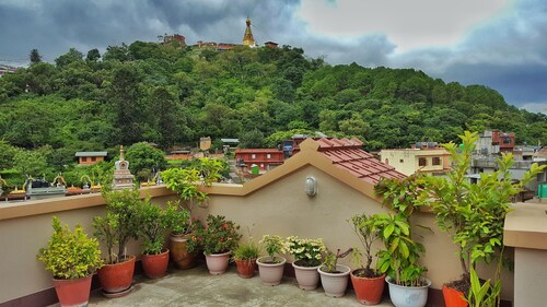 SUPERHOST | Apartamento de 3 dormitorios con temática tibetana artística en Karma Suites