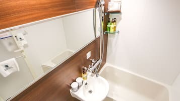 Combined shower/tub, free toiletries, hair dryer, slippers